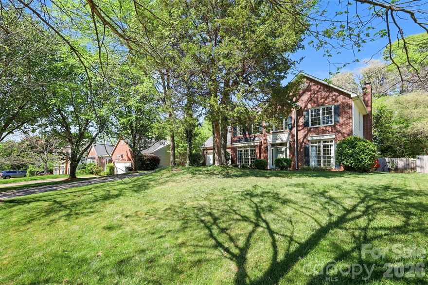 Situated on a beautifully landscaped, tree-lined lot in the sought-after Thornblade community, this elegant home offers a perfect blend of space, comfort, and outdoor living. The classic brick-accented exterior and welcoming front entry create timeless curb appeal, while the expansive yard and mature trees provide a peaceful, private setting.

Inside, the home opens to a bright and inviting layout filled with natural light and thoughtfully designed living spaces. A spacious living room centered around a fireplace flows seamlessly into the surrounding areas, creating an ideal environment for both everyday living and entertaining. The kitchen stands out with its clean, modern feel, featuring a large island, abundant cabinetry, and an open connection to the breakfast area, all overlooking the backyard.

Upstairs, the home continues to impress with generously sized bedrooms and a primary suite designed as a relaxing retreat. Tray ceilings, large windows, and a spa-like bath create a sense of comfort and sophistication, while additional rooms offer flexibility for guests, work-from-home needs, or hobbies.

The outdoor space is truly a highlight, designed for both relaxation and entertaining. Step outside to a private backyard oasis featuring an in-ground pool surrounded by lush greenery, along with a patio and fire pit area that invite you to unwind or host gatherings year-round. The setting feels serene and secluded, making it easy to enjoy both quiet mornings and lively evenings.

Beyond the home, the Matthews location offers a vibrant and convenient lifestyle with easy access to local shops, dining, and entertainment. Nearby parks and greenways provide opportunities for outdoor recreation, while the charming downtown Matthews area offers a mix of community events, farmers markets, and local favorites. With close proximity to major roadways, commuting into Charlotte is simple, giving you the perfect balance of suburban tranquility and city convenience.