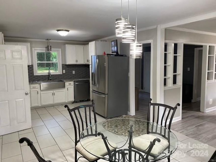 Welcome to your new home! This charming 3-bedroom, 1-story brick ranch offers a blend of comfort and convenience. Located just a short distance from Ballantyne, this property is ideally situated close to shopping, parks, and other amenities.

The home features a welcoming, partially furnished interior with ample living space. Enjoy the large backyard, perfect for outdoor gatherings, and relax on the expansive deck. With no HOA restrictions, you’ll have the freedom to make this space truly your own.

Experience the perfect combination of suburban tranquility and easy access to urban conveniences in this fantastic location. Don’t miss out on this opportunity!