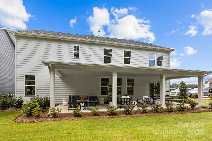 Welcome to Lakeside Glen & our stunning Townsend Plan! Spanning over 3500 sqft, this home offers 5 bdrms, 4.5 baths, & is brimming with upgrades. The open-concept layout includes LVP flooring on the main level, a gourmet kitchen w/ stainless steel appliances, a 5-burner gas cooktop, wall oven, honed countertops, & a spacious island perfect for entertaining. The main floor also features a formal dining room, great room, & a private office. Up the the oak-treaded stairs you will discover a luxurious primary suite w/ a tray ceiling, dual-sink vanity, tiled shower w/ seat, plus a large walk-in closet. Secondary bdrms are well-sized with walk-in closets & share access to a loft. A hall bath w/ double vanity and a second-floor laundry rm w/ a sink, add ample storage & convenience. Enjoy the outdoors from the casual front porch or the expansive covered rear porch. Estimated Completion July 2025.