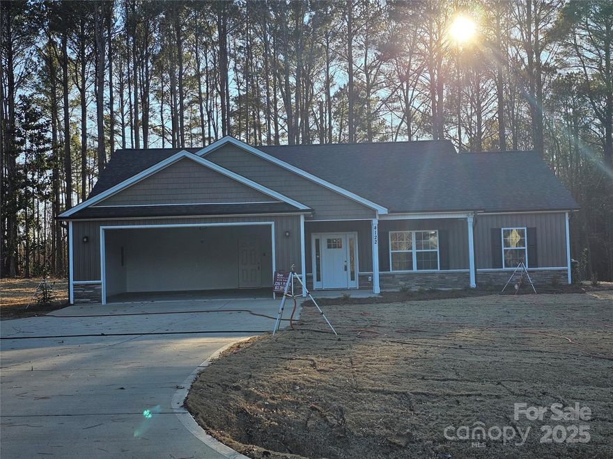 New Construction home.  Has 9ft ceilings, split floor plan, screen rear porch. Large garage.
