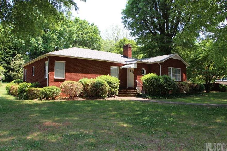 One level living in this all brick ranch w/ cellar basement.  Ready to move-in condition, this home features archways, built-in shelving and nice hardwood floors.  Enter into the large living room w/ fireplace and lots of large windows offering natural light.  The kitchen includes appliances and abundance of cabinet space.  There is a master bedroom w/ built-in desk & cabinets and master bath.  Bedrooms 2, 3, and 2nd full bath are down the hall.  Laundry room is located on the main level and the cellar basement access is located off the kitchen.  This home has a double detached garage, roof, heat & air in 2003 and is located close to food, shopping, & entertainment.