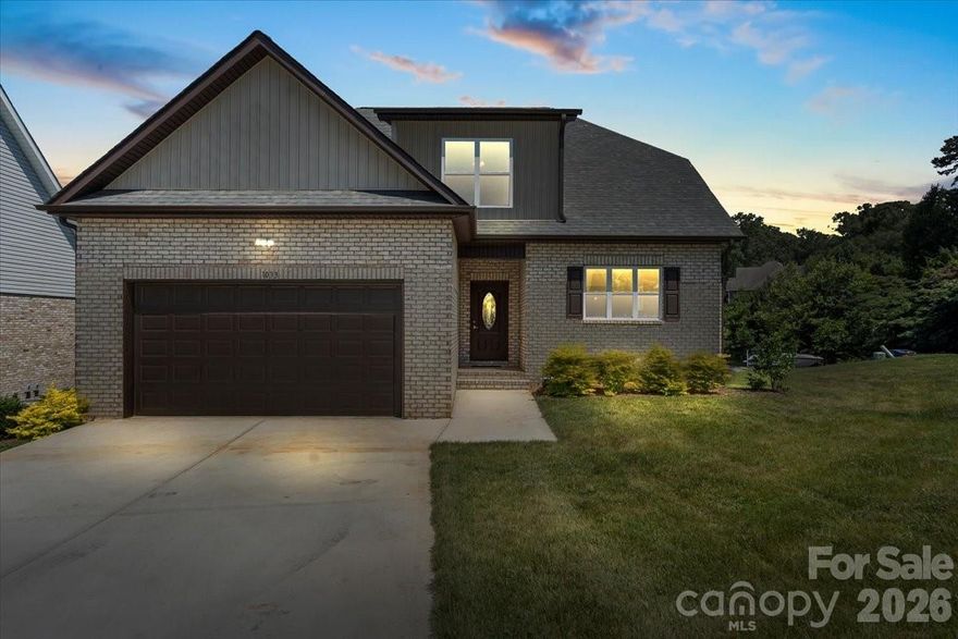 This new construction home is located in the Northwest Hickory Waterstone subdivision. The open floor plan features a large kitchen with gray cabinets, an island, beautiful quartz countertops, and a tile kitchen backsplash. The large master bedroom has a walk-in closet, dual vanities, separate toilet, and tile shower. The house has a pantry and an extra linen closet for storage. The house features 3 bedrooms on the second floor which have large, walk-in closets with a shared double-sink vanity bathroom. All bathrooms have durable tile flooring. The rest of the house features luxury vinyl flooring. The large laundry is situated on the first floor. The living room features a modern, electric fireplace. Great schools systems in the surrounding area. Enjoy this beautiful house with a neighborhood pond.