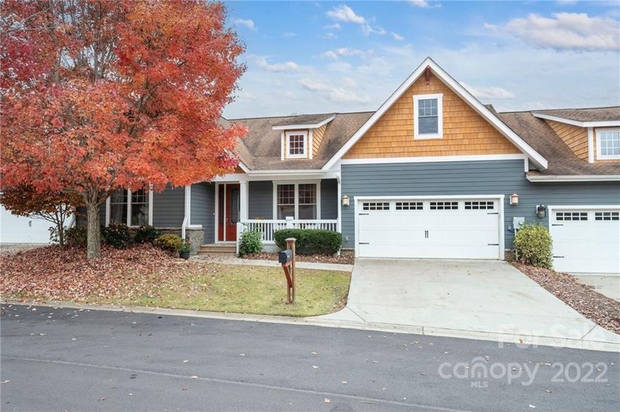 Stunning Craftsman-style townhome in sought-after community of Pinebrook Farms, located between Asheville and Weaverville! Enjoy endless amenities with low HOA fees - soak in the heated pool, get your daily workouts in at the fitness center, take a walk on the well-designed sidewalks or trails, relax on the park benches, and listen to soothing sounds from the rustling creek. Enjoy gatherings at the beautifully designed cabana with an outdoor grill that leads to a large clubhouse and more! This wonderful, light-filled open-plan townhome has 1,933 SF on the main level, including a spacious primary suite, a second bedroom suite (or office), laundry room, sunroom, soaring ceilings, and a gas log fireplace in the great room. Private double decks overlook the creek. Bonus room over garage. Tons of storage. Two-car garage with easy, level driveway. Floor plan offers tons of flexibility. Live on the main level and host the entire family.
