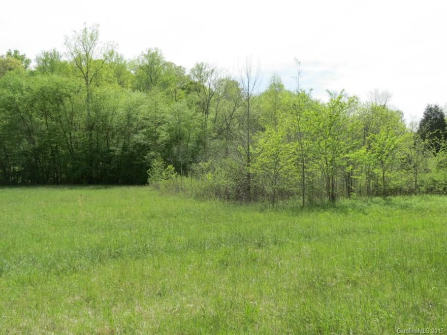 Beautiful 24 acre farm with a nice rolling topo.  This property has several old homes that have no value.  There is a very nice and beautiful creek in the back of the property.  The property sits high along the road with many great build sites.  There are mature hardwoods and beautiful pastures throughout the property.