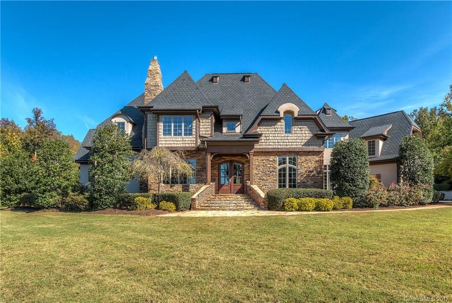 This Luxurious Custom Built Home on over 13+ acres feels like a Resort. State of the Art Gourmet Kitchen for 2 or 50 this Home is a True Show Stopper. Glamorous Mastersuite on the Main w/his/her bathrooms, 4 Junior Suites up, Theater room, Gameroom, Bonus room. Indulge in relaxation indoors/outdoors. This home homes Brazilian cherry hardwoods, architectural/decorative design throughout, Resort Style Saltwater pool & Hot tub,  Full Outdoor Kitchen, 3 Car garage, 3 Fireplaces, Outdoor Terrace.