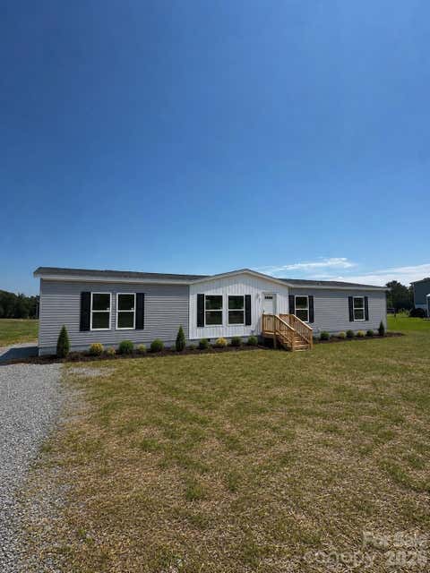 Photo of 857 Henry Jenkins Road #10f, Mooresboro, NC 28114 (MLS # 4418567)