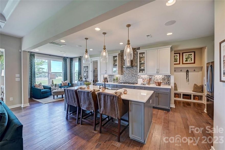 MLS#4052663 FINAL OPPORTUNITY!  Winter Completion! The Wembley is a stunning 2-story home featuring an exquisite 1st floor with an inviting open concept home. Gathering room opens to a gourmet kitchen with large walk-in pantry and luxurious food-prep island with quartz countertops. An exceptionally spacious plan includes a first-floor owner’s suite at the rear of the home, as well as a drop zone and valet. Enjoy the open plan with gathering room with fireplace, flex space and sunroom.  Upper floor features 3 bedrooms and 2 baths, game room and an unfinished storage area.  Structural options added include: Fireplace, tray ceiling in owner's suite & gathering room, sunroom and laundry sink.