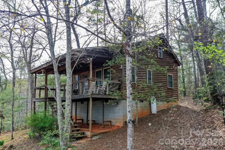Cozy Mountain Getaway near Lake Lure NC-----Rustic 2 bedroom, mountain cabin on the privacy of 2.47 wooded acres. Located just 10 minutes from Lake Lure, this remodeled cabin has hardwood & tile floors and comes fully furnished ready to move in. 4 wheel or all wheel drive needed to access the property or a positive traction rear wheel drive. Priced at $209,000.