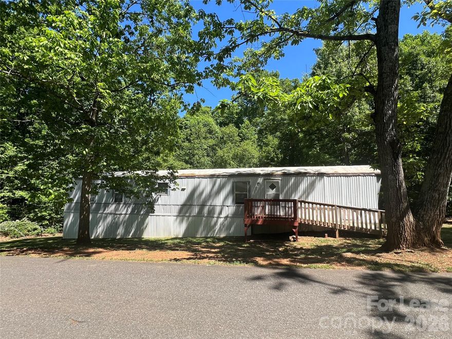 2 bedroom 2 bath mobile home Includes major Kitchen Appliances. Water is included! Central Heat and Air! Run, do not walk, to take this one off of the market!