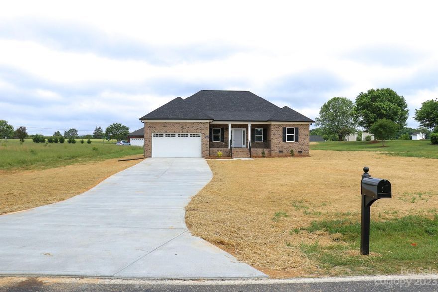 This breathtaking full brick new construction home is waiting for you! Located in a beautiful and calm neighborhood only 10 minutes away from highway US-321 and close to I-85 for convenient access to Gastonia and Charlotte. This house has 3 spacious rooms with walk-in closets, 2 full baths with tile flooring. Laminated floors throughout the entire house, a beautiful rear porch where you and family can enjoy a gorgeous view in the evening. Granite kitchen countertops with a beautiful island, and stainless steel appliances!