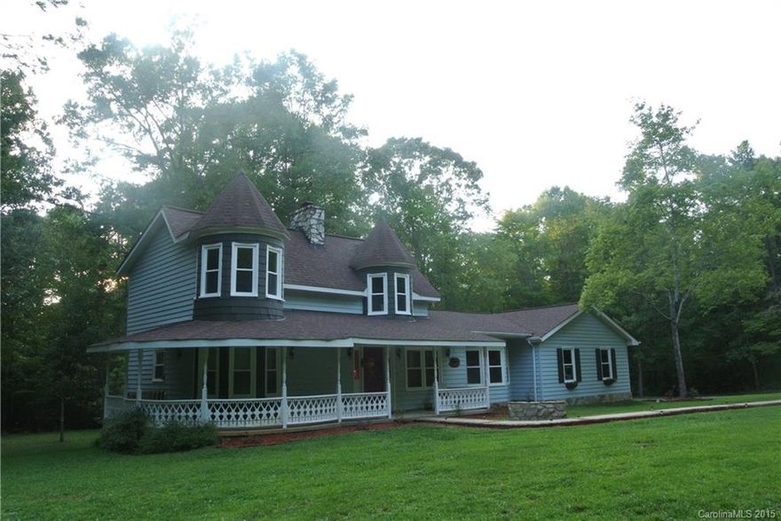 Unique charmer! Under 5 Miles to Waxhaw. Renovated w/new windows, HVAC, granite, lighting, flooring, master suite down w/glamour bath + 2nd bedroom on main could be in-law suite. Wrap around porches + huge deck w/built in seating. Upper floor has 2 large bedrooms w/walk in closets and turrets for charm plus a huge bathroom w/separate shower & tub. 4.4 acres with huge Quonset building w/wood burning stove makes an ideal workshop or home office. Tons of parking for entertaining. Wooded & private.