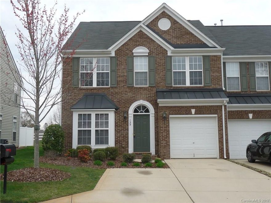 Spacious Townhome in Sought after Fort Mill Neighborhood. Home offers the Master on Main level with big secondary bedrooms. Oversized loft with picket rail provides the open floorplan that appeals to many, End unit allows windows on 3 sides which creates more natural light in the home. Home backs to natural area. Formally was on the golf course, but a decent buffer area and trees remain. Great access to I-77, Schools and Shopping