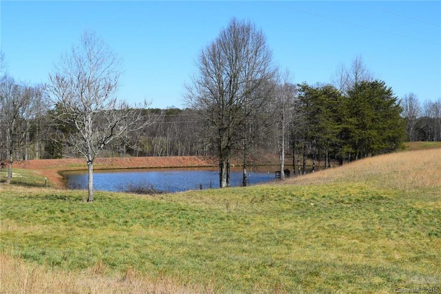 Two homes & 10 acres! This property is unique, in a good way! Both homes were designed to be a good starters. The main house features 2 bdrms, 2 ½ ba, kitchen, living room & laundry. Wood floors, neutral color scheme & in great condition. The second home is about 100 ft away, far enough for privacy, but convenient. This  home is perfect for rental income or family members. The large metal barn/garage has a concrete floor, wired & an additional pole barn area for storage or animals. #3147794