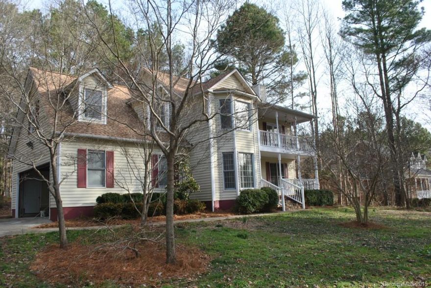 Located in the highly sought-after Clover school district! Come home to this beautifully updated 4 bedroom 2 1/2 bath southern home that features new flooring throughout and has been freshly painted;  new appliances in the large eat in kitchen, separate dining, gas logs in the expansive family room with custom built-in cabinets; Master bedroom opens to a private balcony overlooking the yard!