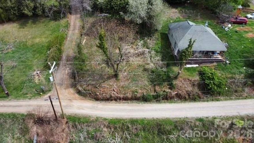 Ready-to-build lot in an established residential area in the heart of Canton, NC. Located at 22 Clark Lane, this approximately 0.16-acre parcel offers a great opportunity for builders, investors, or anyone looking to build a new home in a convenient, small-town setting. Minutes from downtown Canton, NC. Situated about 20 miles west of Asheville 22 Clark Lane is close enough to commute to the city while allowing for that small town lifestyle. Lot has access to City Water and Sewer services. Buyer to verify zoning.