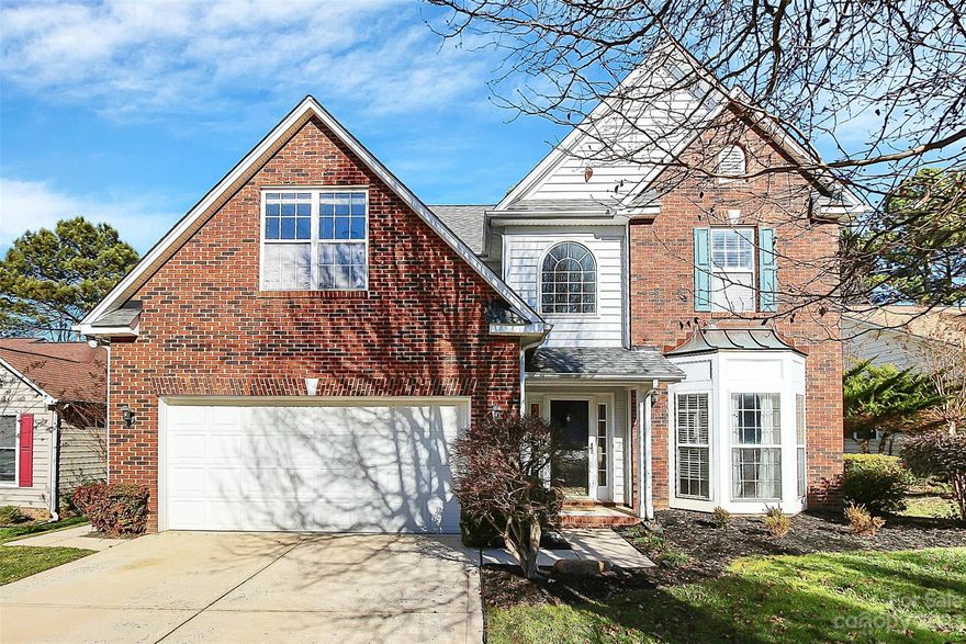 Beat the Spring rush and get settled and ready to enjoy lake life in one of Mooresville's most popular neighborhoods! This traditional two-story home offers a great floor plan with an abundance of windows and natural light, 9 ft ceilings on the main floor, and 5! bedrooms. You will appreciate the open kitchen/breakfast/family room combo with a marble surround gas fireplace and blower for those colder days. Dining room and additional flex space for your specific needs round out the main floor. Relax on the deck and enjoy the lovely, level backyard that offers privacy and beautiful Spring blooms. Other features include: New floors on main August '23, New kitchen appliances Dec '22 (fridge remains!), Fully fenced backyard, Irrigation, Spacious 2 car garage, & Cul-de-sac street. Winslow Bay is a wonderful Lakefront community with fantastic amenities including a community boat launch, dock, & gated boat/recreational vehicle storage as well as close proximity to abundant shopping & dining.