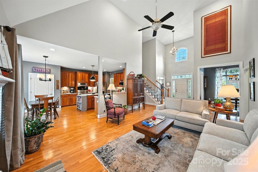 This wonderful home has been taken to the next level with a mile long list of upgrades ($100k+) over the last year! The 4BR/3BA home features a main level primary and a secondary bedroom. Bathed in loads of natural light, the foyer opens into the great room and is flanked by a formal dining area and a study that now features custom built bookshelves. The great room is two-story and has a gas log fireplace. The well-equipped kitchen features newer stainless steel appliances, gas cooktop, double ovens, a new sink & faucet, granite-topped island, Corian countertops, pantry, tile backsplash, and plenty of cabinet space. The primary suite features new site-finished oak flooring, a new soaking tub, new shower head, and an expansive walk-in closet. All three bathrooms have new toilets, sink faucets and drains. A revamped laundry room maximizes space with new custom cabinets and mud sink. Downstairs great room, laundry room, and upstairs bathroom, bonus room and one bedroom all have fresh paint. Upstairs there are two additional bedrooms, full bath and a large bonus room for crafting, theatre, etc. A large finished room that is not heated/cooled makes for fantastic extra storage and leads to the walk-in attic area. Other plumbing upgrades include new exterior spigots and a hot water heater heat pump for added efficiency. A new security system was installed in late 2024. The main level hvac was replaced in fall 2024 and roof in early 2024. The exterior also boasts a long list of updates including but not limited to: a new door from kitchen to deck, new gutters, a redesigned deck, upgraded irrigation system that is controlled from your phone, new flagstone patio, new garage shelving, tree removal and a section of privacy fence along the back property line. There’s not anything for you to do except to bring yourself! Don’t miss this one!