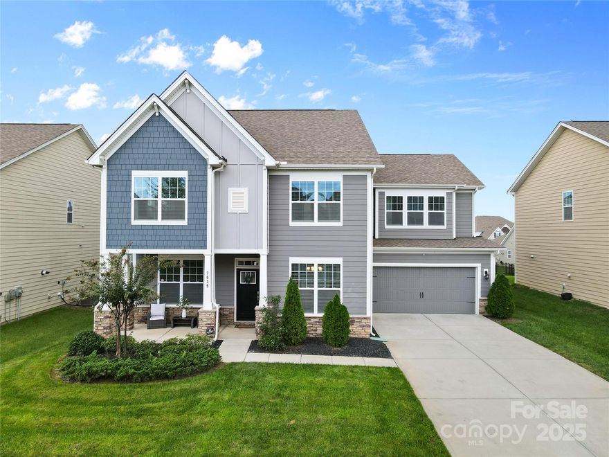 Beautiful 5-bedroom, 4.5-bath home in the heart of Indian Land! Gorgeous engineered wood flooring flows through the main-level living areas, leading to a stunning kitchen with a huge island, double ovens, gas cooktop, granite counters, and a stylish tile backsplash. A main-level guest suite with a full bath provides perfect flexibility for visitors. The large second-floor primary suite features a spacious shower and a massive walk-in closet. Upstairs also offers 4 more oversized secondary bedrooms—one with its own en-suite bath—and a generous bonus room ideal for movie nights, game nights, or a home gym. Enjoy resort-style living in this vibrant community with a clubhouse, pool, sport courts, and workout room. Conveniently located near shopping, dining, and everything Indian Land has to offer!