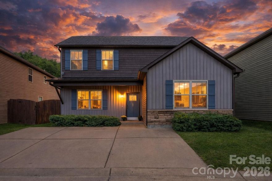 Stylish and move-in ready, this 3-bedroom, 2-bath home in Fletcher’s highly desirable Sycamore Cottages
offers modern comfort and convenience! Built in 2018, this home features an open split-bedroom floor plan with thoughtful design choices throughout. The main level boasts durable luxury vinyl plank flooring and a spacious living area. The bright kitchen is a true highlight, featuring white shaker cabinets, granite countertops, stainless steel appliances, a classic white subway tile backsplash, and a large drop-in sink. Convenient main-level laundry adds to the ease of everyday living. The primary suite includes a generous closet, vaulted ceilings and an en-suite bath with dual sinks and a walk-in shower. Upstairs, two oversized bedrooms—each with their own walk-in closets—share a full bath, making this level perfect for family, guests, or a home office. Step outside to enjoy a private backyard with a full privacy fence, ideal for relaxing, gardening, or entertaining. Just minutes from shopping and dining, less than 20 minutes to Asheville, and convenient to Hendersonville and Brevard, this home combines modern living with a prime location. Don’t miss the opportunity to make this Sycamore Cottages home yours!