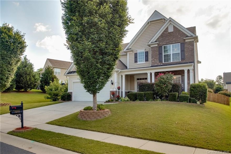 Amazing move-in ready home w/relaxing front porch! Open floor plan w/tons of natural light! Wide plank, distressed hardwoods on main level! Chef's kitchen w/granite counter tops, updated S.S. appliances, gas range, tile back splash, breakfast bar & recessed lights! Huge owners retreat w/tray ceiling, dual vanity, walk-in shower, garden tub & walk-in closet! Bedroom & full bath on main level. Tile flooring in all baths. Large Bonus Room & Laundry Room! Private fenced back yard w/over-sized patio!