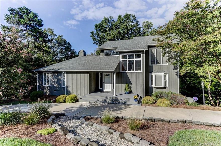 Gorgeous WATERFRONT home with amazing views and sandy beach. Boat lift and floating dock are perfect for living the lake life! Relax in the beautiful main floor master suite.  Gorgeous kitchen. Wood burning stone fireplace in the great room. Beautifully updated bathrooms!  Home warranty included.