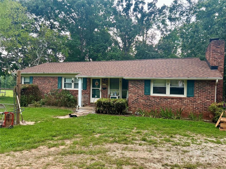 This 2-bedroom, 2-bath home sits on 2.54 acres in Hickory Grove and offers a fantastic opportunity for a full remodel or flip. While the property is in need of updates, several major improvements have already been completed, including a brand-new well installed within the last 6 months, a new water heater within the last 4 months, and a new roof within the last 6–7 months per the sellers. Inside, the home features a wood-burning fireplace that is used every winter, a canning room off the laundry area, and a flex space currently being used as the dining area but also ideal as a den or sitting area. The property also includes five separate outbuildings—all with power connected. The septic system was pumped in 2019 and a new leach field was installed at the same time. With its recent upgrades, multiple outbuildings, and acreage, this property has strong potential for anyone looking for a full renovation project.