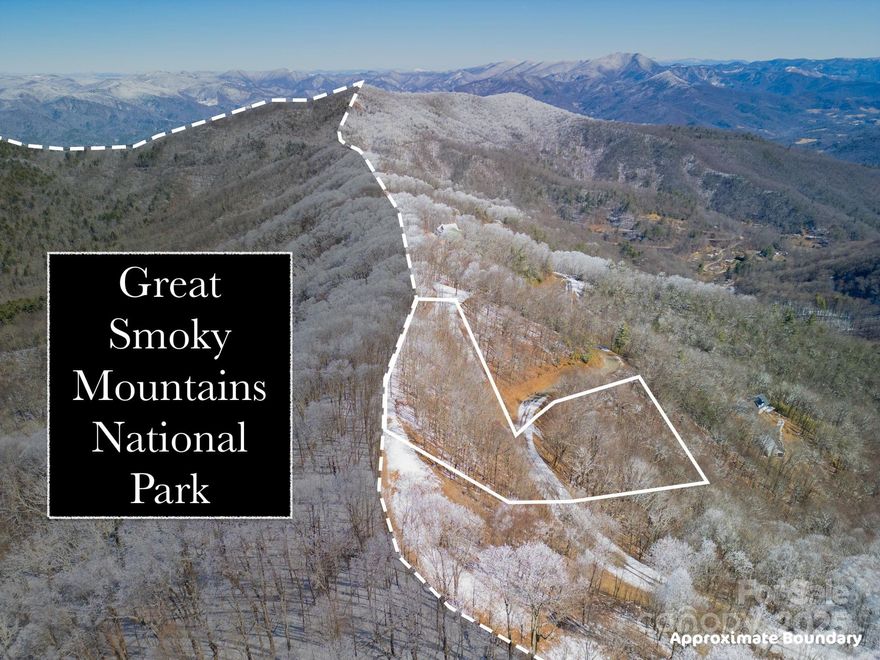 "The Divide" sits along the Cataloochee Divide Trail, bordering the breathtaking Great Smoky Mountains National Park. Step out your back door and onto a trail that offers everything from a peaceful stroll through the GSMNP to a month-long journey along the legendary Appalachian Trail. Just half a mile away, the park’s main entrance provides access to a rich blend of outdoor adventure and history. Whether you’re camping under the stars, fishing in pristine waters, exploring what remains of an original Appalachian settlement, or watching elk graze in the Cataloochee Valley’s scenic fields, the beauty and heritage of the Smokies are right at your doorstep. All of this is a short drive from Waynesville, Maggie Valley, & Asheville. The Divide is a small private gated community with stunning panoramic mountain views around every turn. Lot 11 has direct access to the Great Smoky Mountains National Park. Short term rentals allowed! SELLER FINANCING AVAILABLE! Agent related to seller.