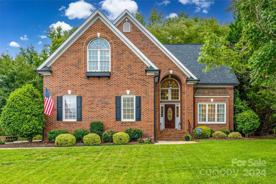 Welcome to your dream home! Step into a stunning 2 story entryway, which looks onto the formal dining area with judges paneling 2/3 up the wall. The custom kitchen features white, soft-close cabinets, integrated lighting, and glass doors to showcase your special items. A massive quartz island and SS appliances, including a built-in drawer microwave, beverage refrigerator, and gas cooktop. Breakfast area with built-in bench, perfect for your morning meals. Beautiful 6" hardwood floors are throughout the entire house, including all bedrooms and closets. Open concept great room which features a stone fireplace and surround sound. The first-floor primary with tray ceiling, double closets, and luxurious bath with frameless shower and dual vanity. Upstairs loft area with plenty of living space, two additional bedrooms, a bonus room for flexible use. Additional small room off a bedroom. Full house generator, tankless WH, shed/playhouse. All in very desirable Channing Park