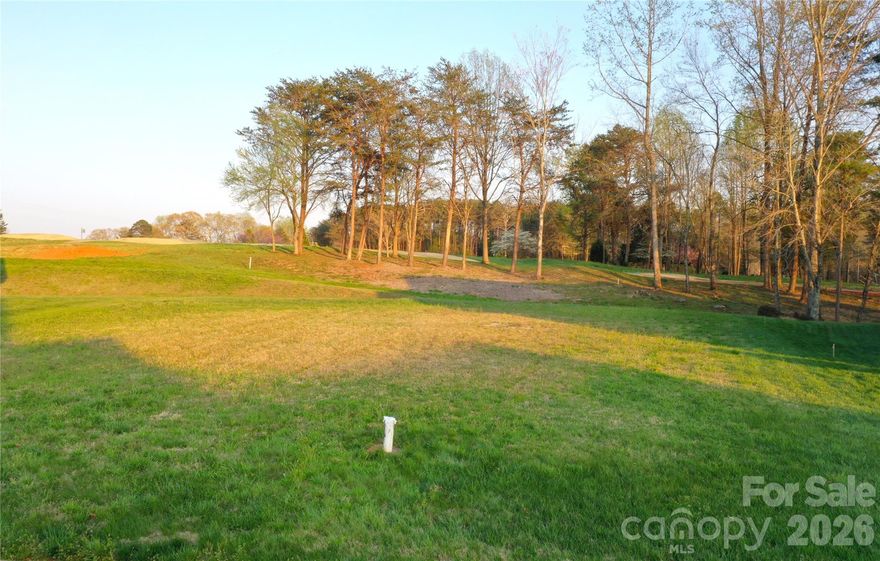 Welcome to Walnut Ridge at Rock Barn, where your dream home finds its perfect clearing. This beautiful lot is located on high ground in the neighborhood and provides views of the 12th hole of the Jones Championship Golf Course at Rock Barn. Life here is about more than just a floor plan; it’s about a community that feels like a retreat. By joining the Rock Barn Golf and Spa, you’ll have a world of relaxation and play at your fingertips, including; Two championship golf courses for sunny afternoons on the green; The renowned Spa and Fitness Center to recharge and unwind; A resort-style aquatic center, plus championship tennis and pickleball courts; Multiple dining options, from casual grills to elegant clubhouses; a dedicated equestrian center for horse lovers. This isn't just a building site; it’s an invitation to a lifestyle that is as active or as leisurely as you want it to be. Come see why this prestigious corner of Rock Barn is the perfect place to plant your roots!