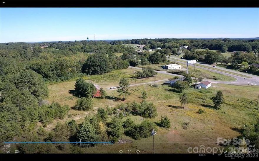 LOCATION, LOCATION, LOCATION *RECENTLY REZONED* to (HB) Highway Business with use as a STORAGE FACILITY. PRIME COMMERCIAL REAL ESTATE fronting Highway 74 and Passaic Street. Located approx 10 mins from the Monroe Expressway. Concept Site Plans have been approved for approx 83,100 sq. ft (600 Units) of storage and approx 840 sq. st of office space. Both indoor & outdoor storage on concept plans. Utilities at front of property (city sewer, city water, electric (poles). EASY ACCESS...Property has very rare egress point to allow both east and west entry and exit onto highway 74. Topography allows for minimal site work. There are 2 houses and pole barn on property. New housing developments within approx 16 miles (Kellerton Place) (True Homes - Scotch Meadows) and a new development approx 3 minutes away.