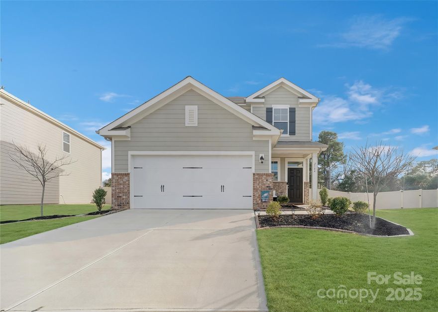 Welcome to Blue Sky Meadows community, where modern style meets the warmth of home. Just two years old and this beautiful home feels new, bright, and move-in ready. The rare three-bedroom version of this floor plan offers plenty of room to grow and live comfortably, with thoughtful touches throughout. Ideally located just minutes from the Highway 74 Expressway, it offers easy access to Uptown Charlotte—perfect for a quick getaway for a night out in the city. Step inside and you’ll immediately notice the open, floor plan in the kitchen to living area. The heart of the home is the bright, inviting kitchen, open to a huge living area, stainless steel appliances, quartz countertops, and an oversized island that’s perfect for family gatherings or casual entertaining. Durable LVP flooring flows seamlessly through the main living areas. Upstairs, you’ll find three spacious bedrooms, two full baths, and a convenient laundry room—all designed to make daily life easy. Outside, enjoy a large, tree-lined flat backyard, offering privacy and a peaceful setting for play or relaxation. Installed new private fencing and installed new pergola with lights on the upgraded concrete slab to give the backyard some life.  Smart home features with cameras & thermostat bring the ease of technology. Blue Sky Meadows residents love the community’s resort-style amenities, including a sparkling pool, cabana, walking trails, playground, dog park, and pavilion. With its ideal layout, modern finishes, and welcoming neighborhood vibe, this home has everything you’ve been hoping to find—and more.