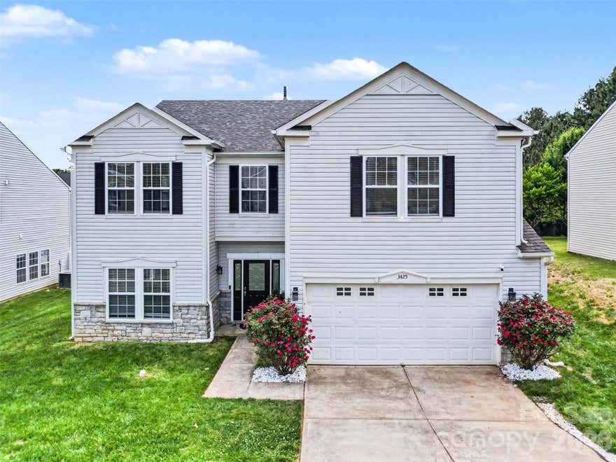 Welcome to this spacious and inviting home in the desirable Crowders View community, where comfort and everyday living come together seamlessly. This two-story residence offers an impressive amount of living space with a layout designed for both entertaining and relaxation. From the moment you enter, you’re greeted by elegant columned accents and an open flow that connects the main living areas in a way that feels both grand and welcoming.
The main level features expansive living and dining spaces filled with natural light, creating the perfect setting for gatherings or quiet evenings at home. The kitchen opens effortlessly to the living area, offering generous counter space, rich cabinetry, and a central island that anchors the room. Upstairs, the home continues to impress with a versatile loft area and well-sized bedrooms, while the primary suite provides a comfortable retreat with room to unwind.
Step outside to a beautiful backyard featuring an extended patio and natural gas line—perfect for grilling, entertaining, or relaxing while enjoying the Carolina weather. The lot offers a balance of open lawn and tree-lined privacy, giving you a peaceful outdoor setting without sacrificing convenience.
The home is also conveniently situated near shopping, dining, and everyday essentials in Gastonia, with easy access to major routes for commuting into Charlotte and surrounding areas.
This home combines space, style, and location in a way that truly stands out, offering a lifestyle that is both comfortable and connected.