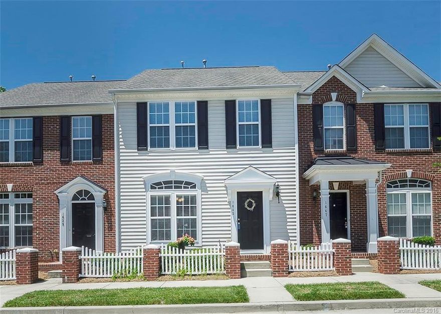 Spacious Open Floorplan Townhome in Convenient Manchester Village!  Less than a mile from interstates and walking distance to shopping and dining.  Hardwood floors in the kitchen and dining area.  Updated tile backsplash!  Huge Great Room opens to the patio.  Two large master suites upstairs both with en-suite baths.