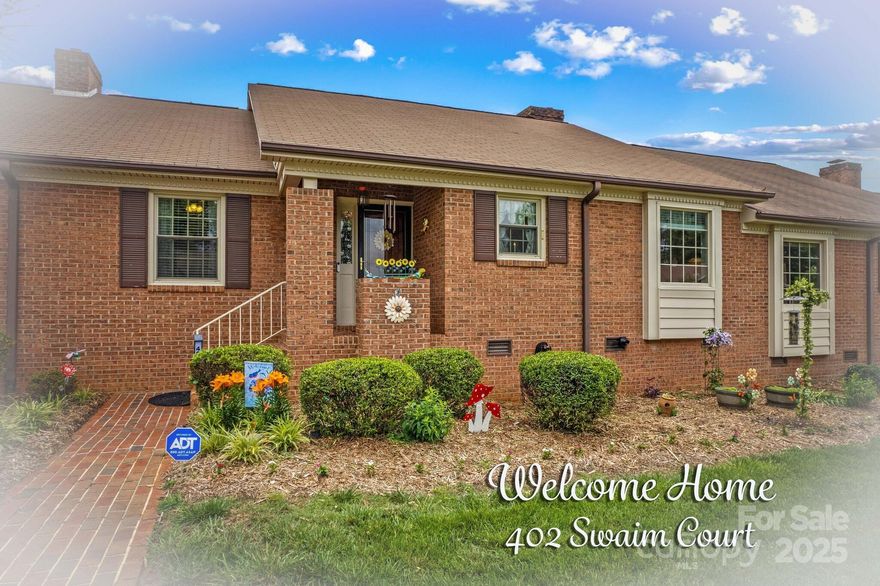 Welcome to this exceptional townhome in the sought-after Castlewood subdivision! Boasting 2 bedrooms, 2.5 baths, 2 car garage and over 1,800 sf, this home offers comfort and convenience close to I-85, the hospital, dining, and shopping. The spacious living area features a brick fireplace and electric insert, leading to a bright sunroom—perfect for an office or relaxing nook. A large kitchen with stainless appliances and ample prep space is ideal for cooking and entertaining. The primary suite has a walk-in closet, double vanity, and marble-surround walk-in shower. The second bedroom is generous, with a tub/shower combo bath. The basement includes 442 sf of finished space with an extra half bath and a 268 sf workshop with utility sink. Don’t forget the enclosed crawl area for storage or a wine cellar! No worries about stairs—this home includes a mobile stair lift. Outside, enjoy beautiful landscaping and a peaceful setting. HVAC 2020—everything’s updated and move in ready!  VA loan that is assumable - call today for more info!!!