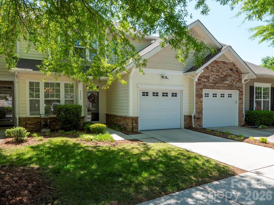 Welcome to this beautifully positioned townhome overlooking the golf course, where comfort meets picturesque views. Thoughtfully designed, this home offers dual primary suites—including a highly desirable main-level retreat for added convenience and flexibility. Step inside to a welcoming entry that opens to a formal dining area and a bright, open-concept layout. The well-appointed kitchen seamlessly connects to the spacious family room and features granite countertops, a built-in microwave, and bar seating—perfect for casual dining or entertaining. The family room is a true centerpiece, highlighted by a cozy gas fireplace and a striking two-story ceiling that fills the space with natural light. Enjoy seamless indoor-outdoor living with direct access to the deck from both the family room and the main-level primary suite—ideal for relaxing while taking in serene golf course views. The private deck is equipped with a built-in gas line, making outdoor grilling effortless while you take in serene golf course views. Upstairs, a versatile loft provides additional living or workspace. The second primary suite is generously sized and includes a private en-suite bath, while an additional guest bedroom also features its own full bathroom, offering comfort and privacy for family or visitors. This exceptional home combines thoughtful design, functional living spaces, and stunning views—an opportunity not to be missed.
