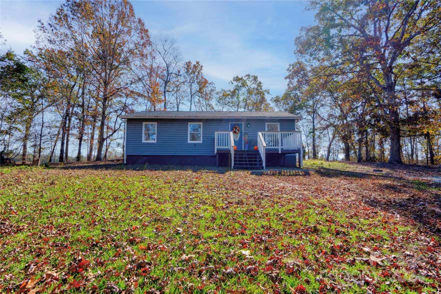 This 3-bedroom, 1-bath ranch home offers a spacious kitchen with an island, granite countertops, and all appliances included. The primary bedroom features two closets for added storage. The roof in one year old.  Outside, you'll find a front deck, an oversized single detached garage, and a small storage building. Perfect for comfortable living and convenient storage!