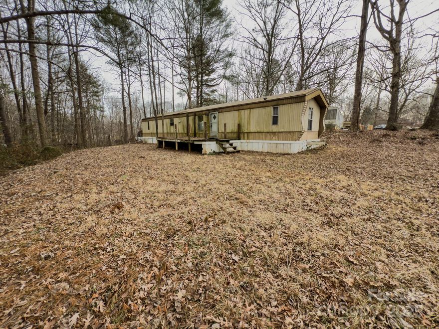 This 0.56-acre corner property offers a great opportunity for investors or DIY enthusiasts. The existing mobile home has been demoed on the inside, providing a blank slate to renovate and make it your own. We do not have a title nor we can locate the vin to the single wide so it's deemed at no value.  Situated in a peaceful, rural setting, this fixer-upper is perfect for creating your dream home or a rental property. With plenty of potential, this property is ready for your vision and creativity. Sold as-is. Don’t miss this affordable opportunity!