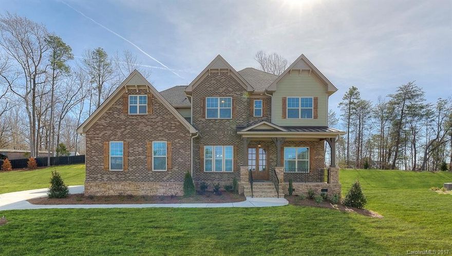 Gorgeous 2-Story home called "The Kendrick" has 5 Bedroom, 4 bath, SCREEN PORCH &  3 Car Sideload Garage. The Details are breathtaking in this home from the curb appeal to intricate details of the chef style kitchen. Mahogany front door, 10' ceilings on main level, Stone fireplace in family rm. w/antique white cabinets. Lavish hardwoods floors in the main entertainment areas. Coffered ceiling in the dining rm. w/ oversized 7.25" crown. Tankless water heater, fully sodded yard w/ full irrigation.