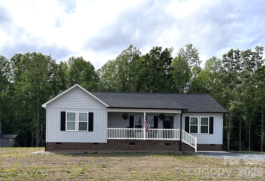 Step into comfort and style at 4442 New Hope Church Rd. A nicely designed 3 bedrooms and 2 full baths. 1620 square feet for you to spread out in sitting on a nice one acre lot. Upon arriving you will be greeted by a charming covered front porch perfect for coffee or afternoon tea. A spacious open concept floor plan with easy to maintain luxury vinyl plank flooring. The kitchen has beautiful white cabinetry, granite counter tops and a island perfect for sitting around with extra storage. The spacious owner's suite offers a wonderful retreat feel, a large walk in closet and a beautiful en suite bathroom with dual sinks. The laundry room is perfectly placed by the back door and easily accessible to the en suite. The back door leads you onto a nice deck perfect for outdoor entertaining and a large yard waiting for you to make it your own.