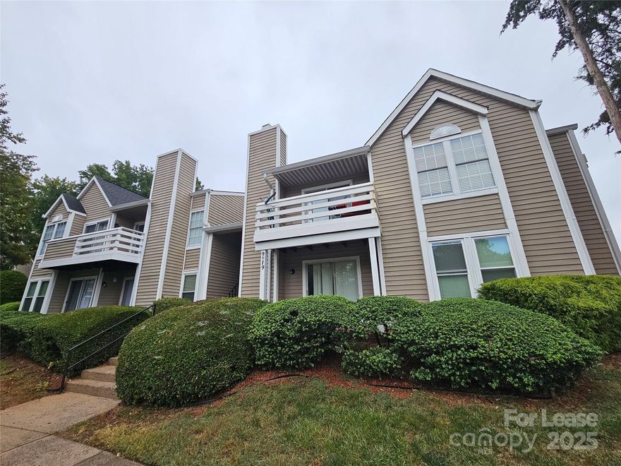 Nestled in the College Downs community, this cozy 2 bed 2 bath 839 sq ft garden-style condo is calling your name! You are welcomed into a spacious living area with beautiful wood laminate flooring! The eat-in galley-style kitchen features a passthrough breakfast bar and a full appliance package.  The condo offers two bedrooms and two full baths. Enjoy the large windows that bring in ample natural light to each bedroom. A washer and dryer set are included for resident use! Enjoy the great outdoors on your covered patio!  *Please note this home is unfurnished. Virtual staging has been implemented to enhance visual placement of furniture. This property is in the university area of Charlotte and within walking distance to UNCC, restaurants and retail!