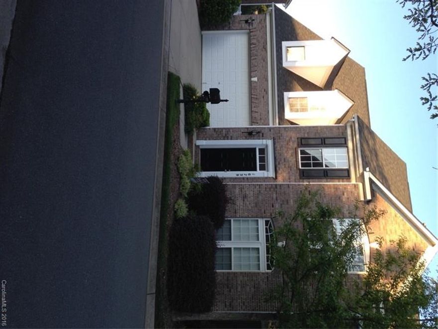 Gorgeous, freshly painted townhome with attached 2-car garage. This wonderful end unit is completely turn-key and one of the best locations in the complex. Chef's kitchen with gas cooktop, double ovens, granite counters, and tile backsplash. Master Suite on main with walk-in closet and deluxe bath with dual sinks, garden tub, and separate shower. Bonus room has a large closet and is wired for surround sound; could be 4th bedroom. Large extended patio with private, peaceful views of nature area.