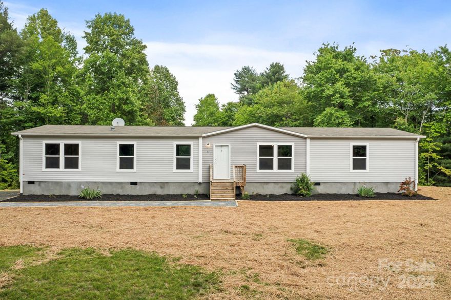 Welcome to your dream home! Freshly updated manufactured doublewide nestled on over an acre lot, this stunning residence boasts four spacious bedrooms and two beautiful bathrooms. The property is a testament to immaculate upkeep, reflecting meticulous attention to detail in every corner.
Step inside to discover an open concept layout that seamlessly blends modern elegance with comfortable living. The expansive living area flows effortlessly into the gourmet kitchen, perfect for entertaining and everyday family gatherings. Large windows throughout the home invite an abundance of natural light. 
The serene primary suite offers a private retreat with a beautifully appointed ensuite bathroom. The additional three bedrooms are generously sized, providing ample space for family, guests, or a home office.
Outside, over an acre of  land provides endless possibilities for outdoor activities, gardening. The option of purchasing additional acreage - up to 8+ acres.