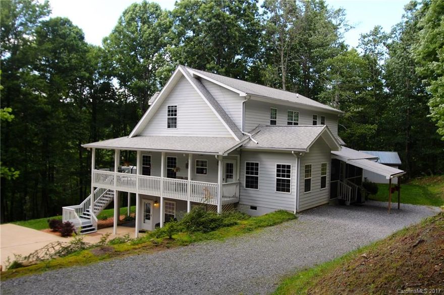 Jump on your bike and be at the Dupont State Forest in only a few minutes, over 4300 sq ft, including a separate income producing apartment downstairs, and privacy enough in the floor plan for lots of guests! So many features, including new carpet upstairs, generator, separate hvac for each living area, updated kitchens. Home has a farmhouse feel with modern features . And the apartment downstairs is adorable with new carpet Notes:3 BR Septic on file