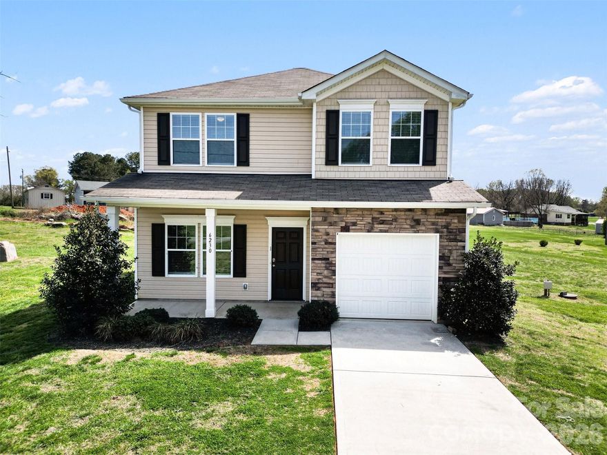 Welcome to this newer construction home in Kannapolis, offering a modern design and a bright, open layout set on a spacious lot with room to enjoy outdoor living . Built in 2022, the home features attractive curb appeal with a combination of stone accents and clean architectural lines, all set back on a wide homesite that provides a sense of openness and privacy.

Inside, the main level showcases an open floorplan that seamlessly connects the living area, dining space, and kitchen, creating a comfortable and functional space for both everyday living and entertaining. Large windows bring in natural light, enhancing the airy feel of the home while highlighting the updated finishes and modern design throughout.

Upstairs, the bedrooms are thoughtfully arranged to provide both comfort and separation, including a spacious primary suite that offers a relaxing retreat with a well-designed en-suite bath and ample closet space. Additional bedrooms provide flexibility for guests, a home office, or everyday living needs.

Step outside to the backyard, where the generous lot size truly stands out. The open, level yard offers plenty of space for outdoor activities, entertaining, or future enhancements, with room to create your ideal outdoor setup.

Located in Kannapolis, the home offers convenient access to local shopping, dining, and major roadways, while still providing a quieter residential setting. Combining newer construction, modern finishes, and a large lot, this home is a great opportunity for comfortable living with room to grow.