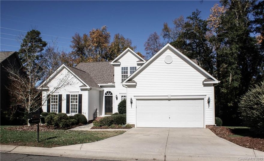 UNBELIEVABLE LAKE WYLIE MAIN CHANNEL VIEWS! Adorable updated home w/ open flr plan & 3 bedrooms on main. 10' ceilings give this home a large living feel. Kitchen w/ new granite opens to great room & sunroom over looking massive lake views. Large dining room. Hardwood floors. Updated light & ceiling fan fixtures. Large storage below grade w/ concrete pad. Deeded shared boat dock. Lovely wide beach & views makes this lot a rare find. Comm pool. Convenient to I77, shopping, restaurants, & hospital.