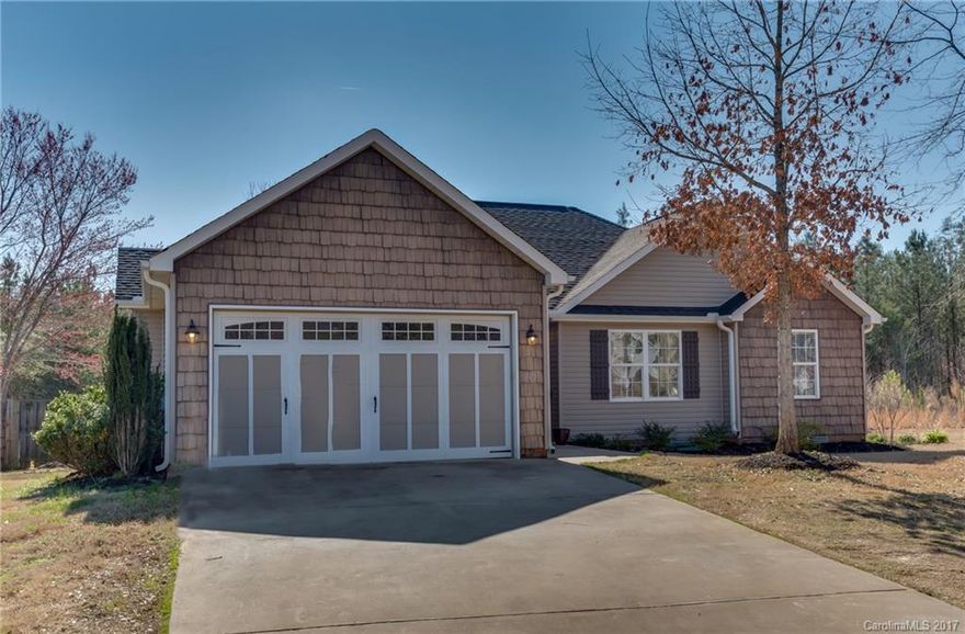 One level home with an open floor plan conveniently located near downtown Landrum.  Lots of natural light, real hard wood floors, fenced back yard and split bedrooms.  Easy access to I-26 and in School District 1 .  This home is in move-in condition.