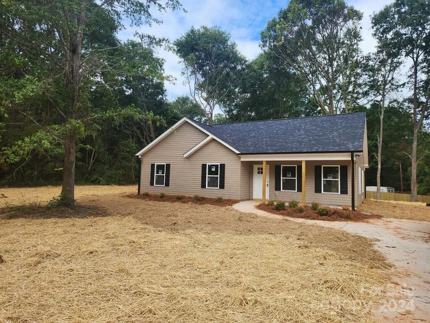 This house will be completed by August 16th, 2024 Most photos of the completed house are renderings of the home to be built. Rendered photos are reversed of actual layout. This cutie is just what you're looking for including 3 bedrooms, 2 full baths, open kitchen/living room/dining room, and covered back porch. No HOA and award-winning Clover schools. What more could you ask for!!   Interior and exterior colors and finishes may vary from renderings.