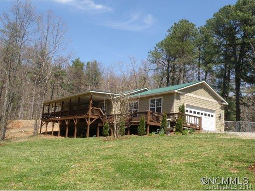 Immaculate home on 3.47 acres, great open floor plan, large kitchen w/island & 42" cabinets & stainless appliances, central vacuum,  separate detached clean approx 60x24 garage/workshop- ideal for working on cars, family room, large master bedroom-w/walk-in closet, master bath w/jetted tub, metal roof, portion of deed book & Page & Pin#, Acreage surveyed off larger tract best guess is 3.805 acres