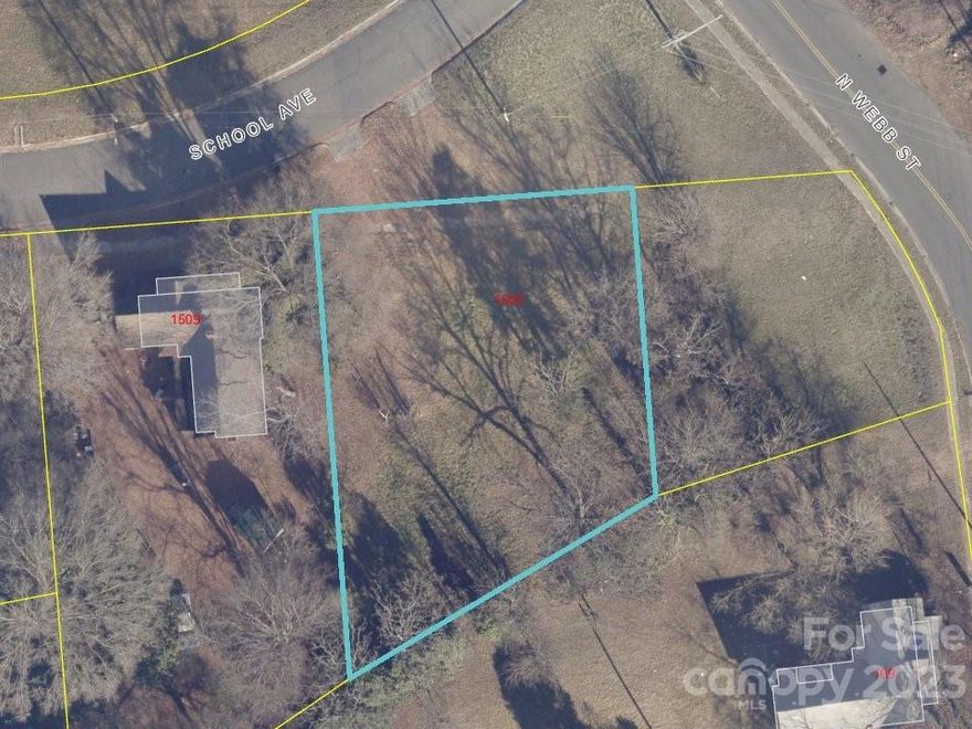 .28 acre lot across from the old Arlington School building. Zoning is currently C-3 commercial. At one time this lot had a home on it so water/sewer taps should be in place.