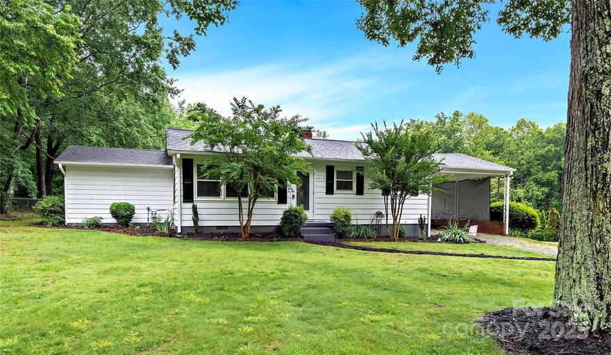 Welcome to this charming 3-bedroom home, nestled on a spacious one-acre lot in beautiful Davidson County. This well-maintained property offers the perfect blend of comfort and functionality, featuring a bright and inviting living space warmed by a cozy portable gas fireplace and a full bathroom. Step outside to enjoy the expansive fenced backyard—perfect for pets, play, or outdoor entertaining—while the attached carport provides convenient, covered parking and additional storage. With its peaceful setting and generous lot size, this home offers the tranquility of country living just minutes from local amenities.